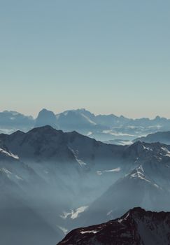 Breathtaking view of snow-covered mountains in Soelden, Tyrol, Austria, showcasing frosty beauty and serene winter atmosphere.