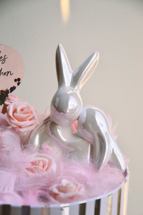 Free Gray Rabbit on Pink and White Rose Stock Photo