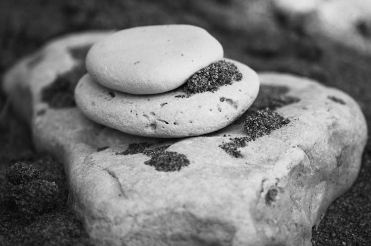 Stacked Of Rocks In Grayscale Photography 