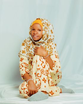 Baby in White and Brown Floral Hoodie