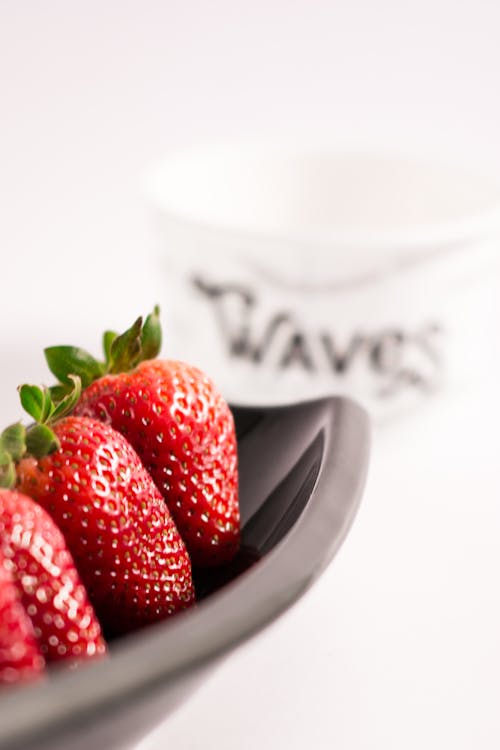 fresh Strawberries on Black Ceramic Bowl