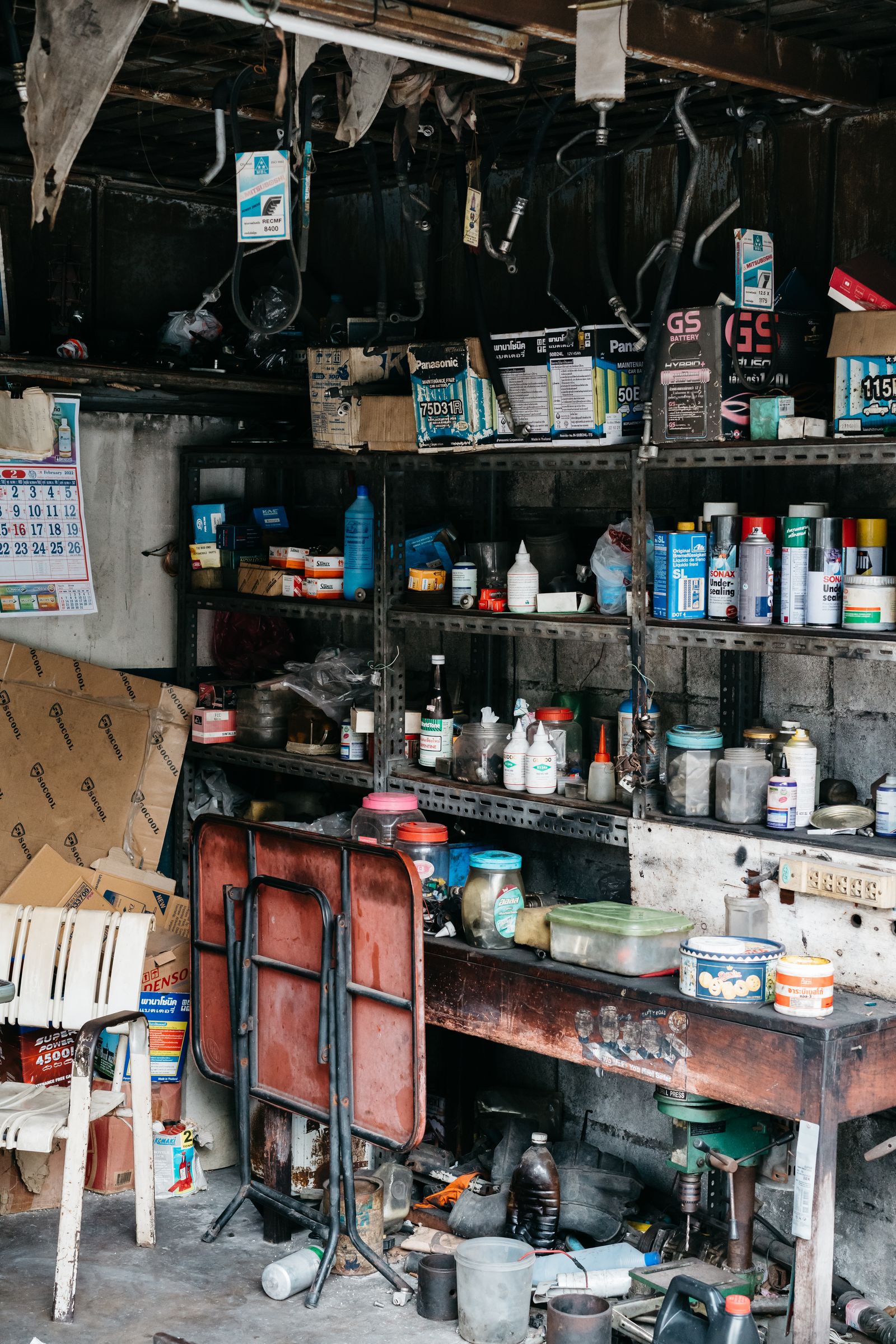 Cluttered garage before junk removal and cleanout