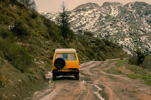 Back View of a Yellow 4x4 on Off-road