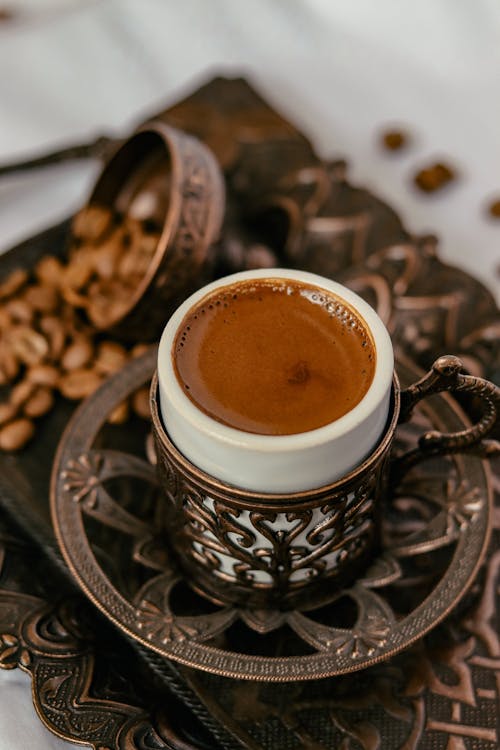Free Coffee in a Traditional Turkish Coffee Cup Stock Photo