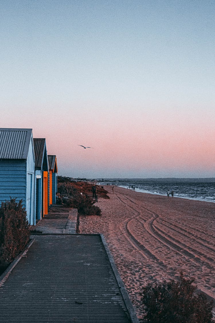 Cabins On The Beach During Sunset