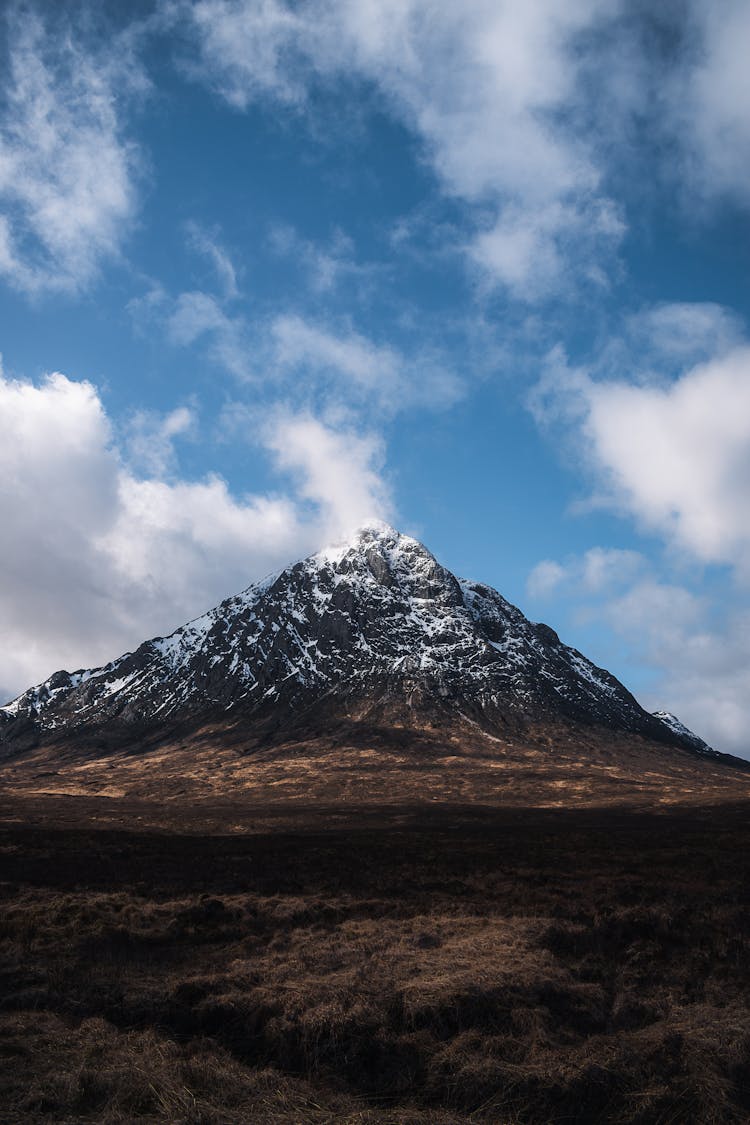 Snow Capped Mountains At Glen Etive In The Scottish Highlands