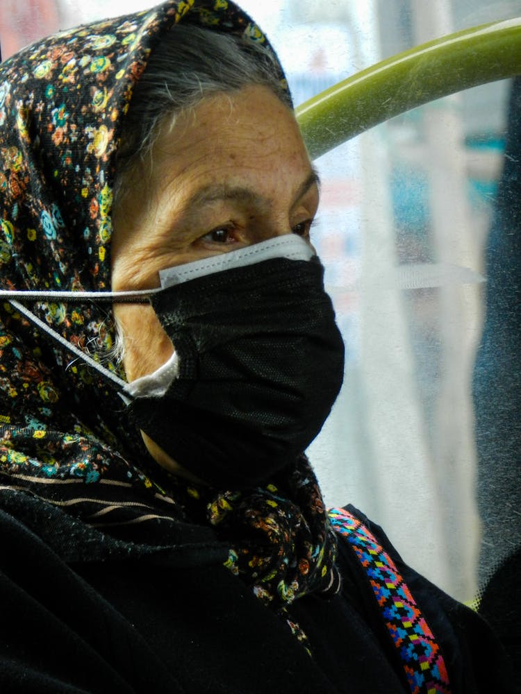 Woman In Floral Headscarf Wearing Face Masks