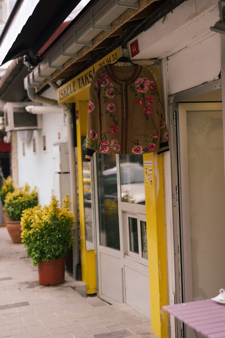 Brown Floral Jacket Hanging Outside