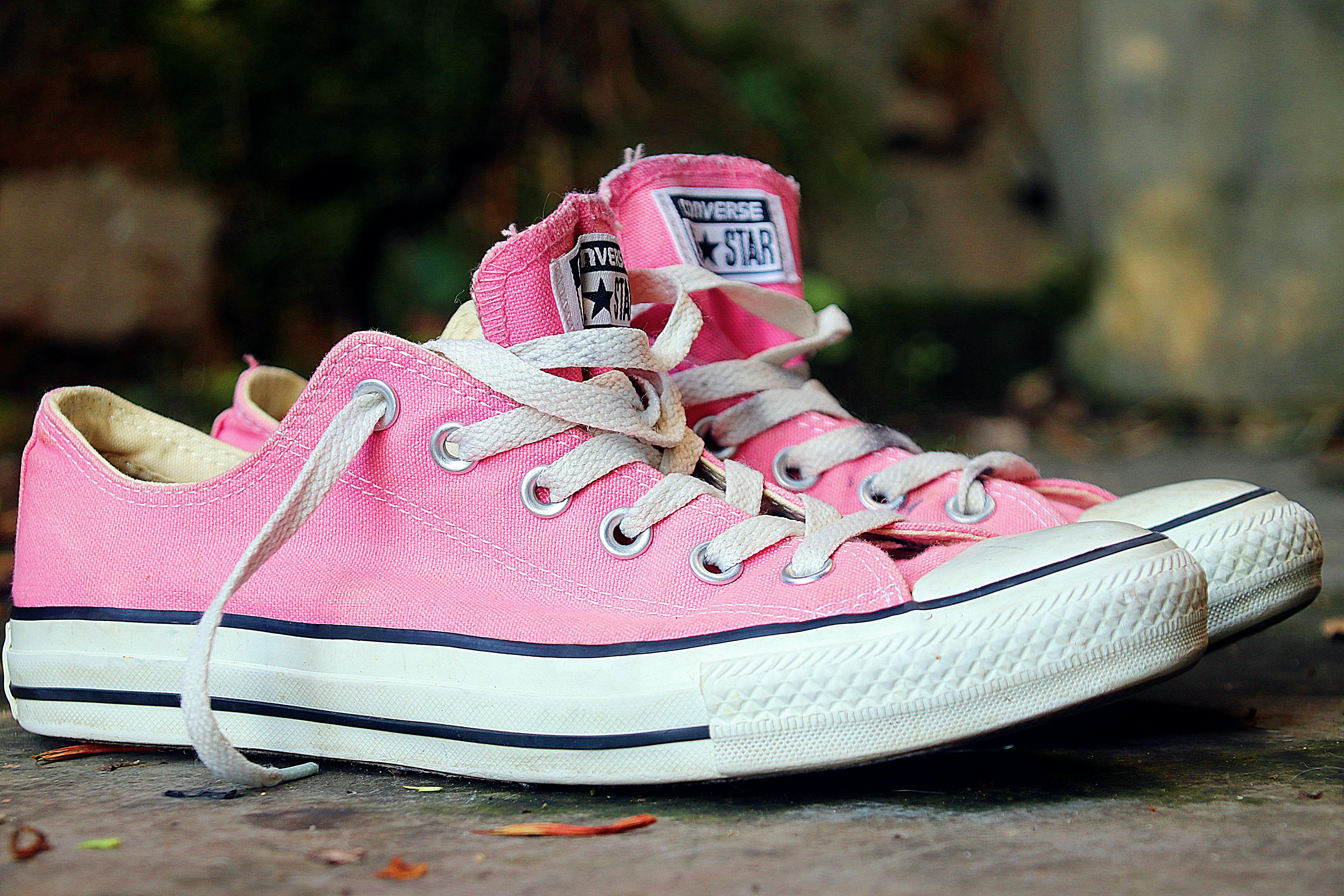 Pink Sneaker Shoes in Close Up Photography Free Stock Photo