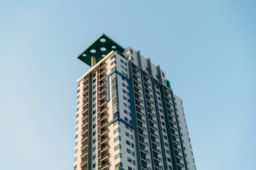 Gray and Beige Concrete Building Under Blue Sky