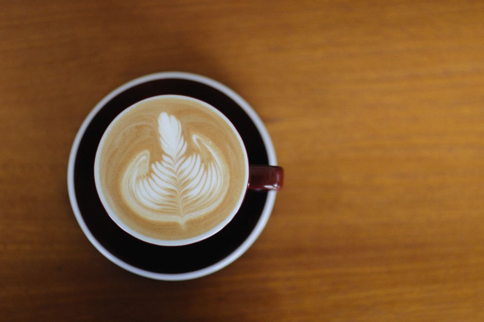 Cappuccino with intricate latte art