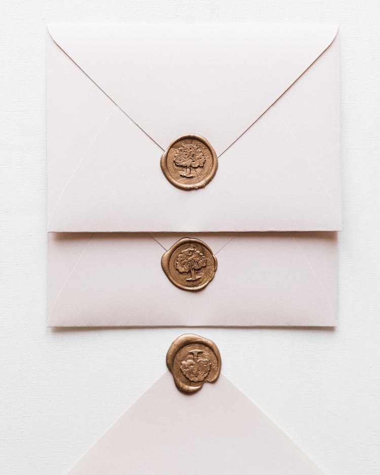 Three White Envelopes Two Sealed With Wax Seal