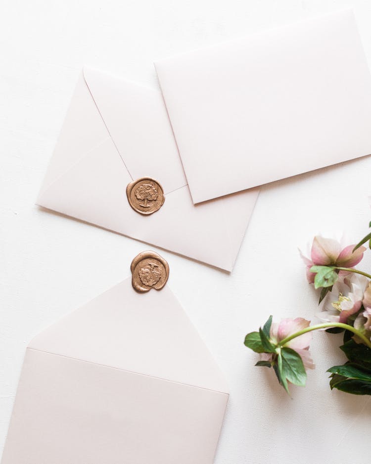 White Envelopes Scattered On Table