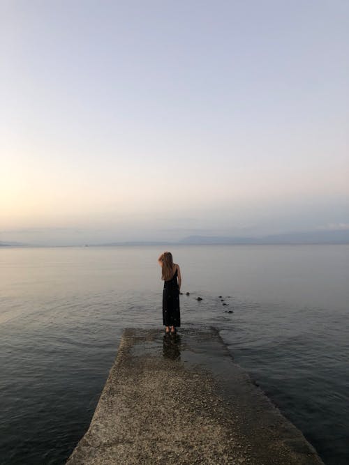 Woman Black Dress Standing on Seaside