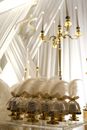 Lighted Candles on Brass Candle Holders