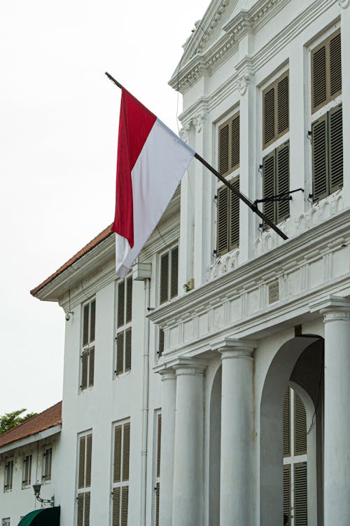 An Indonesian Flag Hanging from a Government Building
