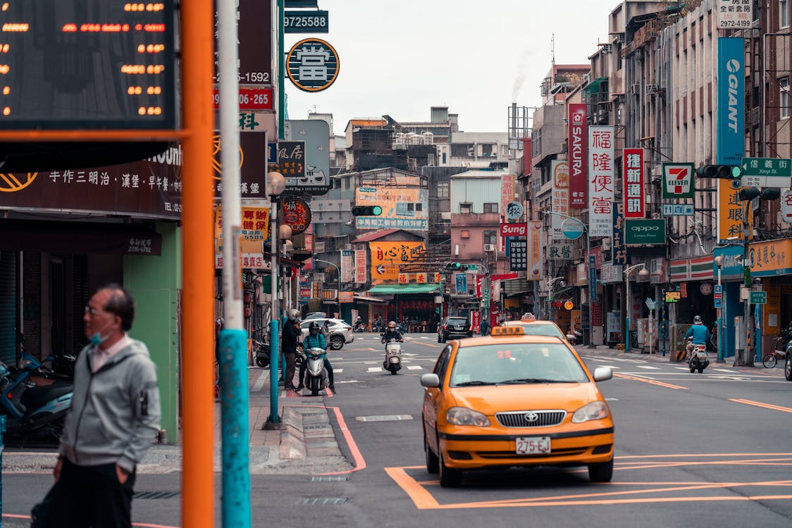 Free Taxi Car on Road Stock Photo