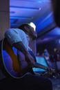 A Man Playing Acoustic Guitar