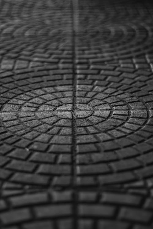 Grayscale Photo of Pavers