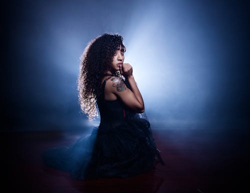 Photography of a Woman Wearing Black Dress