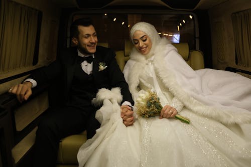 Married Couple Inside a Vehicle