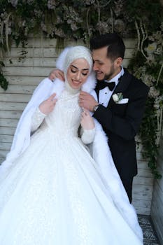 A couple embraces on their wedding day, exuding elegance and love.