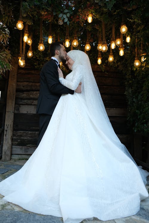 A Newlywed Couple Kissing