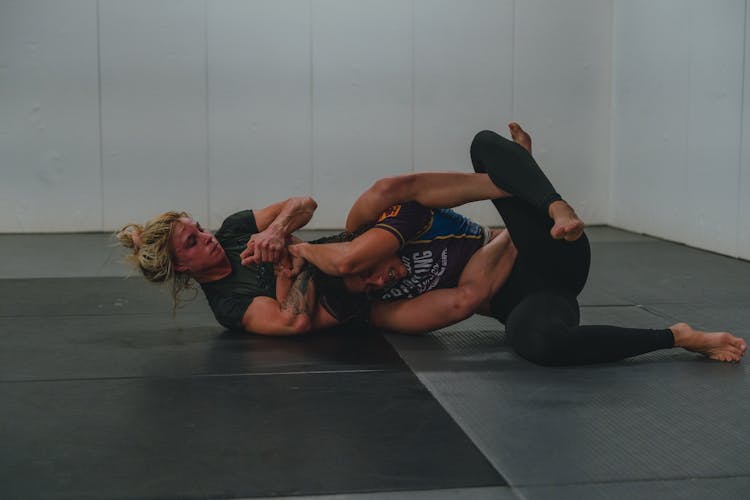 Women Fighting On A Mat