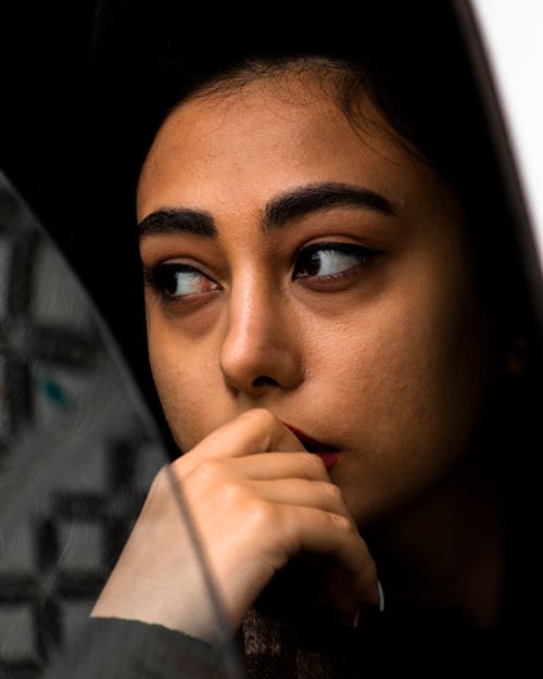 Close Up Photo of a Woman's Face