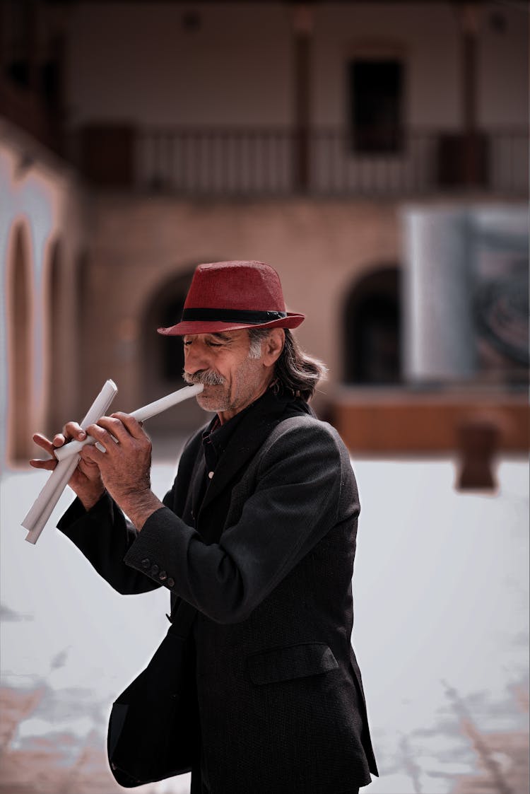 Man Playing Flute