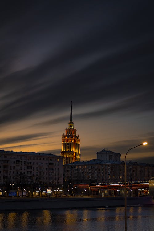 Illuminated Tower in City