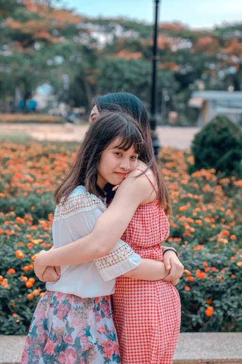 Free Women Hugging Each Other Stock Photo