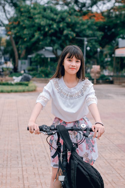 Free Woman Riding Bicycle Stock Photo