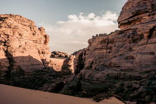 Free Stunning rock formations in the Algerian Sahara near Djanet, showcasing nature's raw beauty. Stock Photo