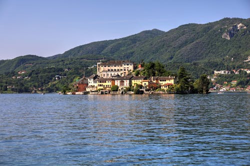 House by the Lake near the Mountains