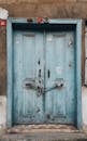 Blue Wooden Door With Padlock