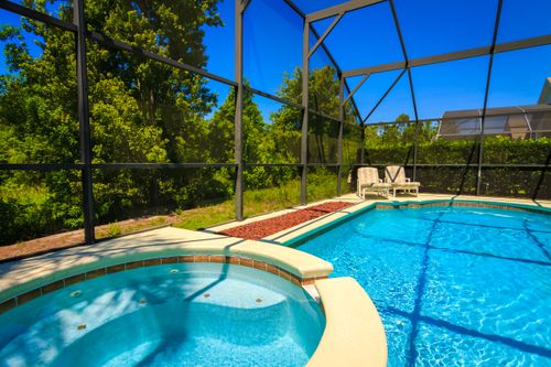 Free stock photo of blue pool in florida, sunny tropical pool, tropical swimming pool Stock Photo