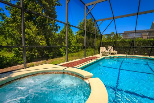 Free stock photo of beautiful pool, green and tropical pool, luxury swimming pool Stock Photo