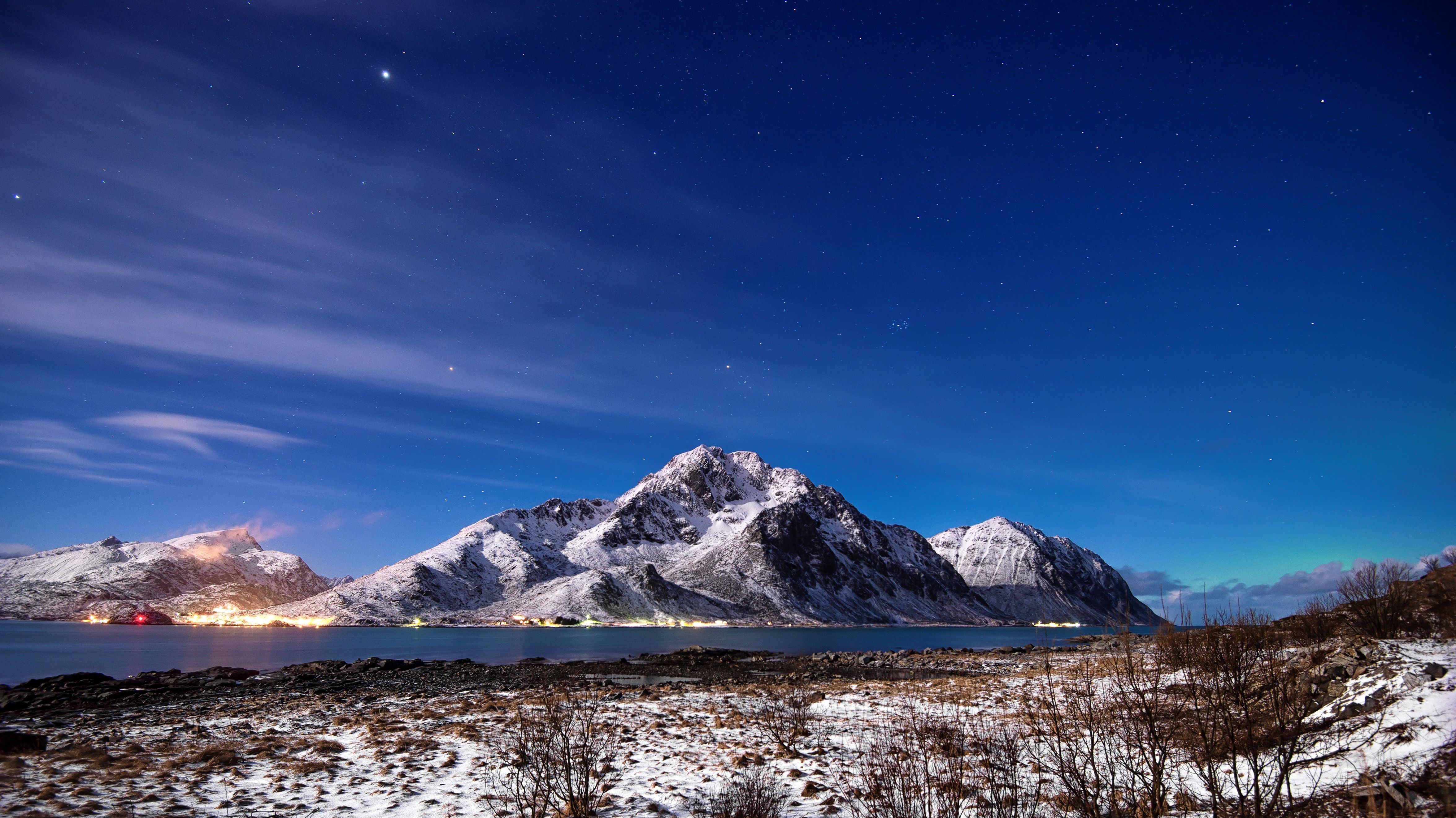 Snow Covered Mountain Under Starry Blue Sky · Free Stock Photo