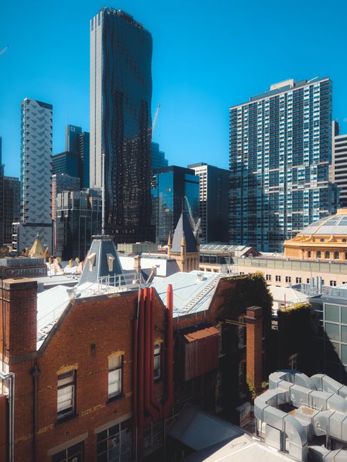 Free A blend of modern skyscrapers and historic buildings create an urban skyline Stock Photo