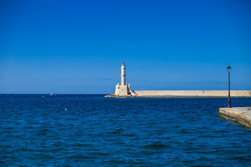Lighthouse Tower Under Blue Sky