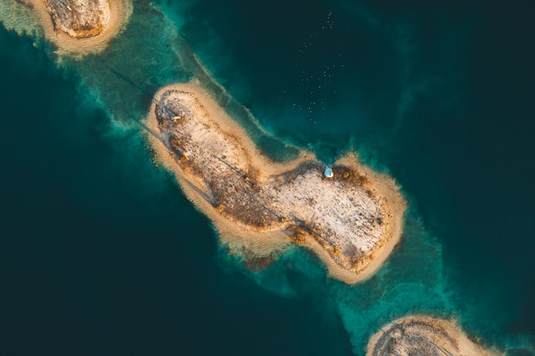 Aerial View Of Islands Surrounded With Turquoise Water