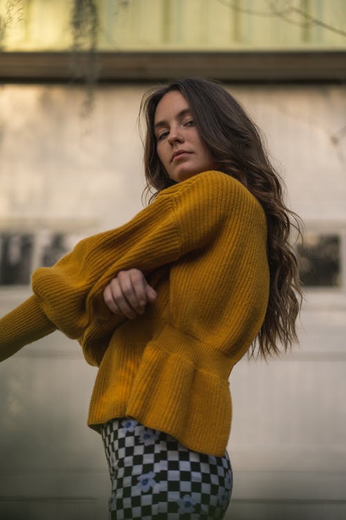 Woman in Knitted Sweater Posing