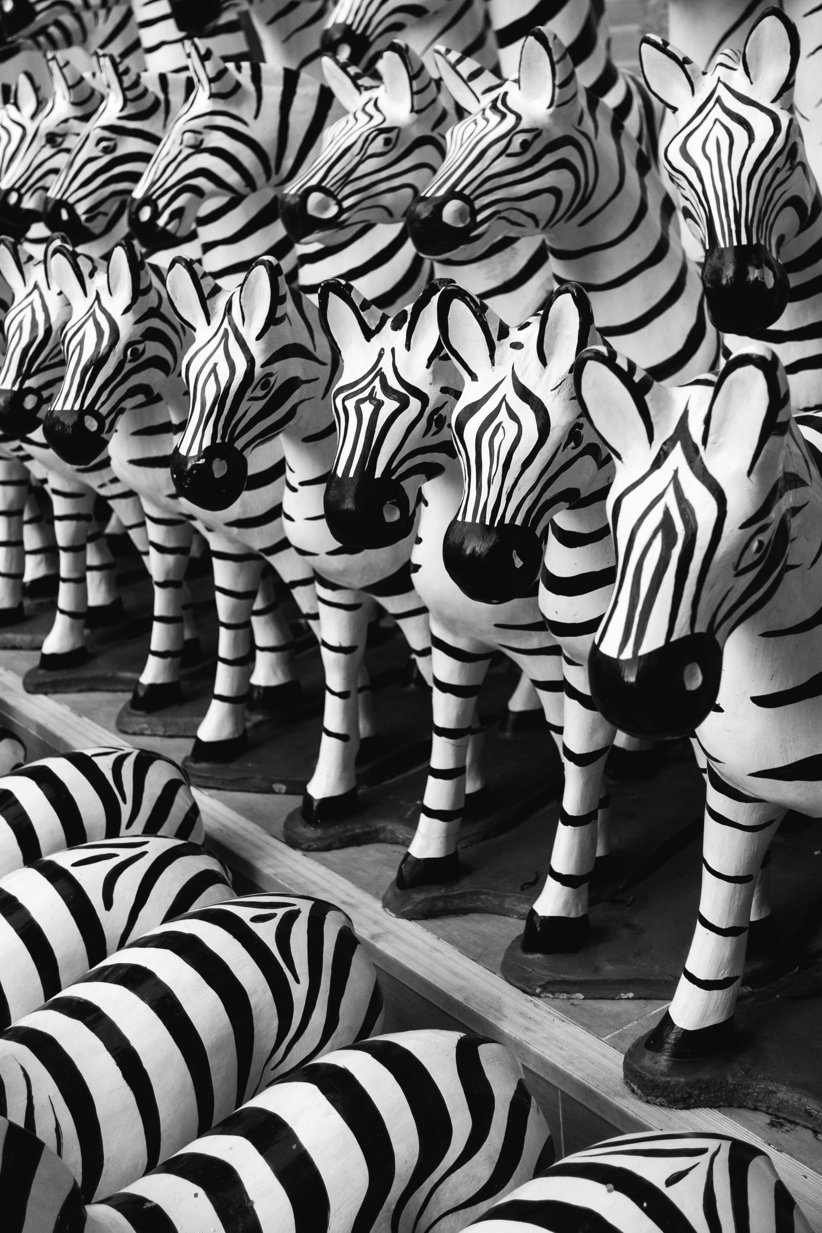 handmade painted zebra toys on shelf