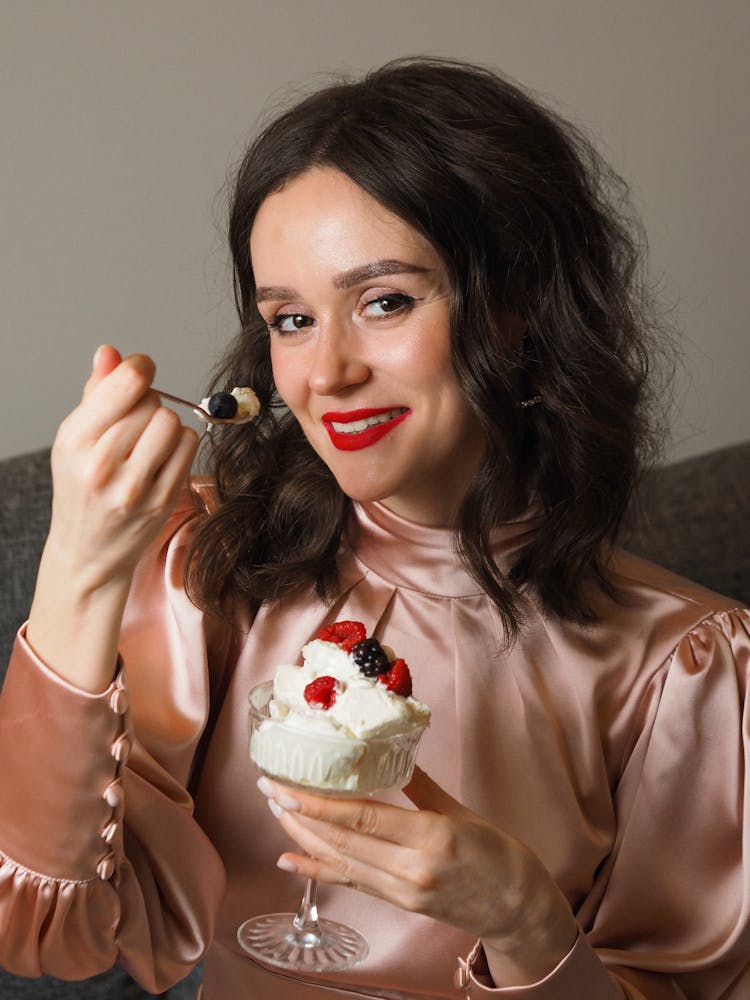 A Woman Eating Dessert