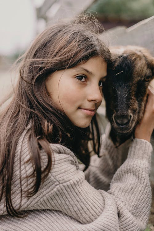 Teenage Girl with a Goat 