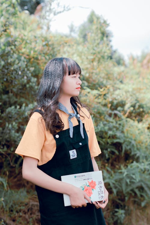 Free Woman Holding Book Stock Photo