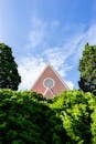 Brown and White Concrete Church Under Blue Sky