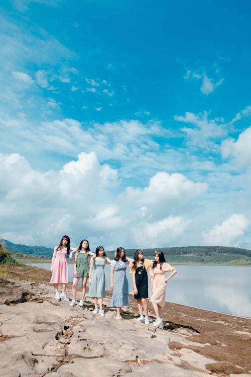 Photo of Six Women on Brown Soil