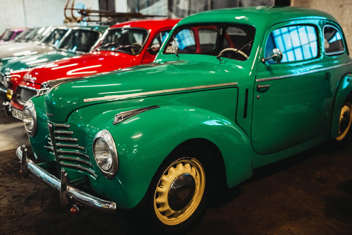 Free Vintage Cars Parked inside the Garage Stock Photo